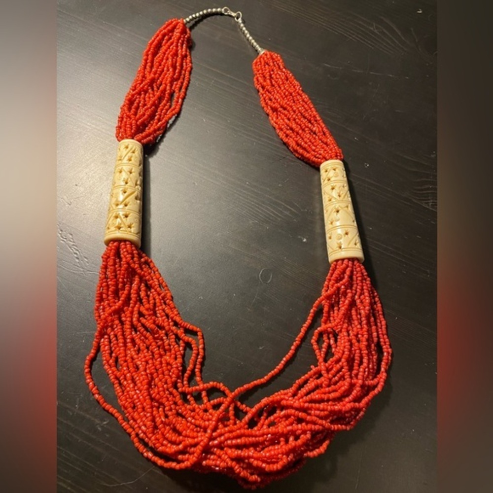 Tribal Tibetan Multi-Strand red Coral Bead Necklace With Carved Bone Accents.